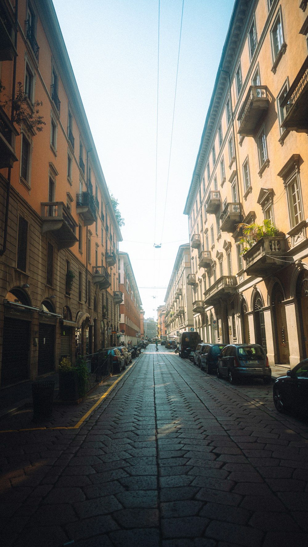 a street with cars parked on the side