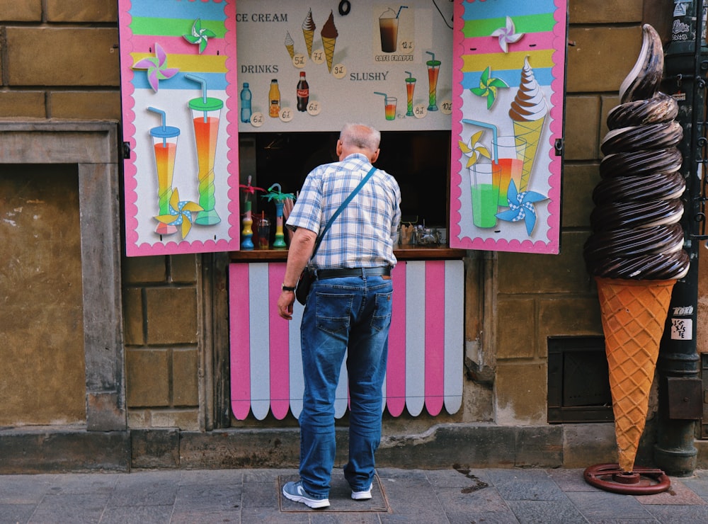 a person standing in front of a storefront