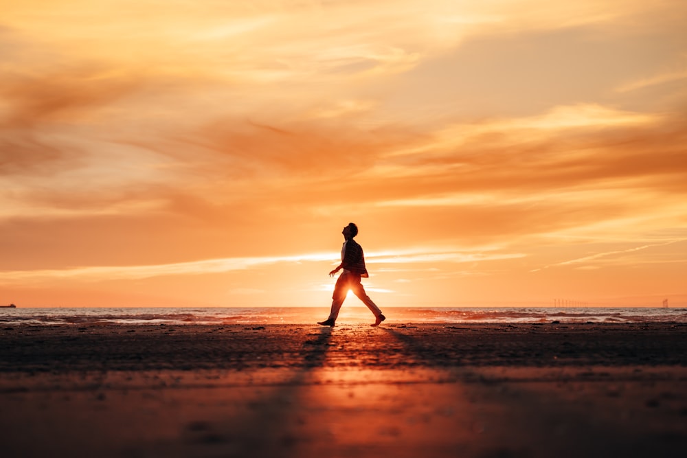 a person running on a beach