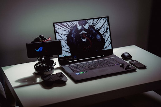 a laptop sits on a desk
