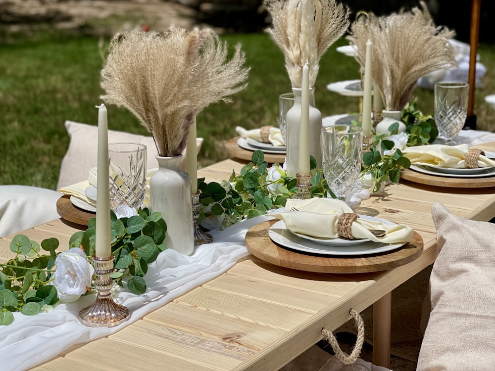 a table with plates and glasses