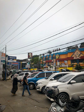 A crowded Chicago street with cars circling for parking spots.