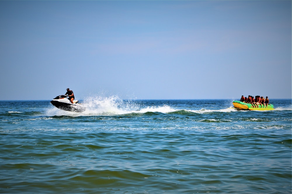 a group of people riding a jet ski