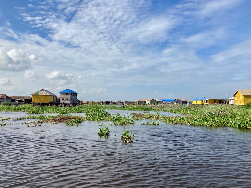 a body of water with buildings along it