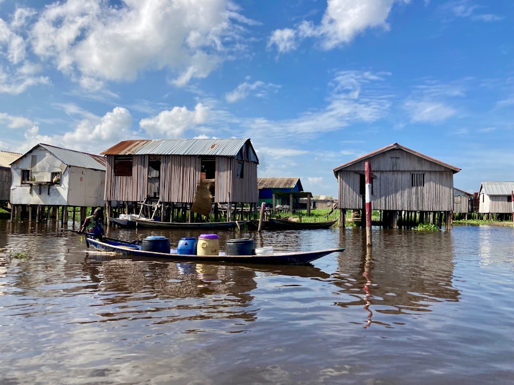 a boat in the water with Tonlé Sap in the background
