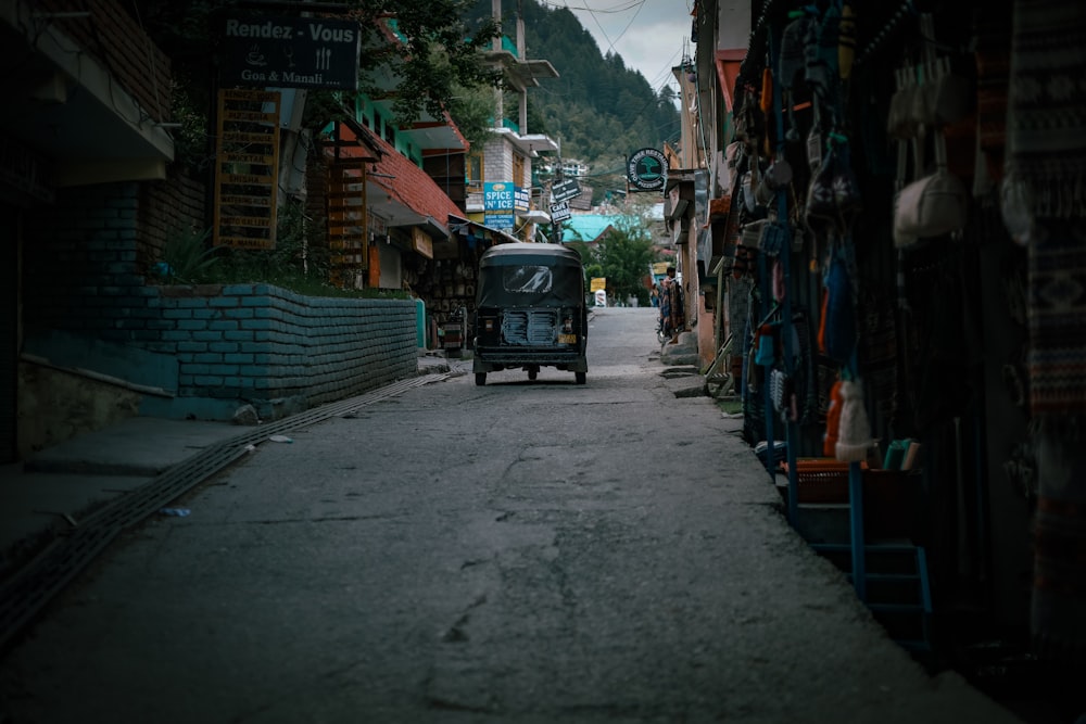 a street with a car parked on the side