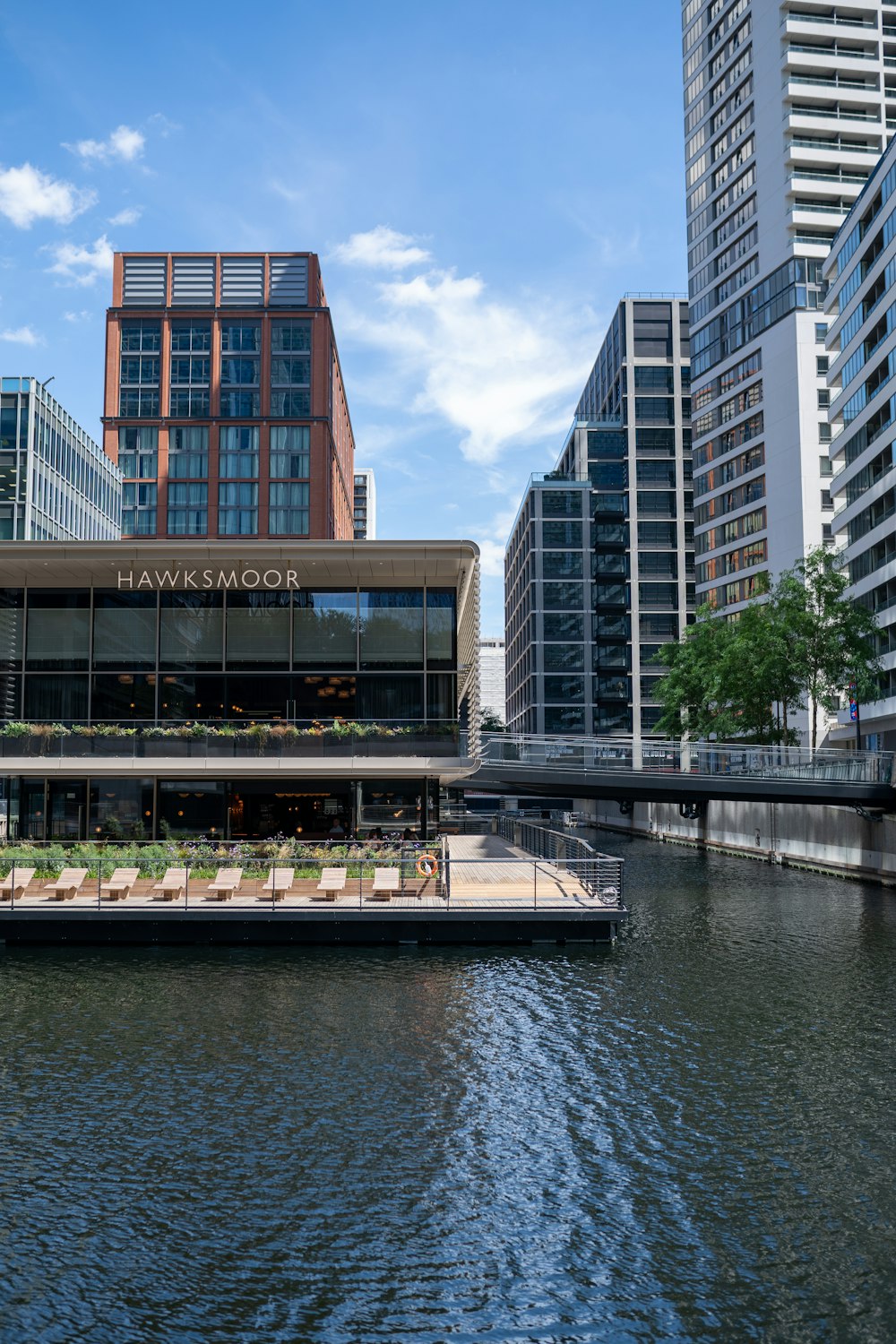 a body of water with buildings around it