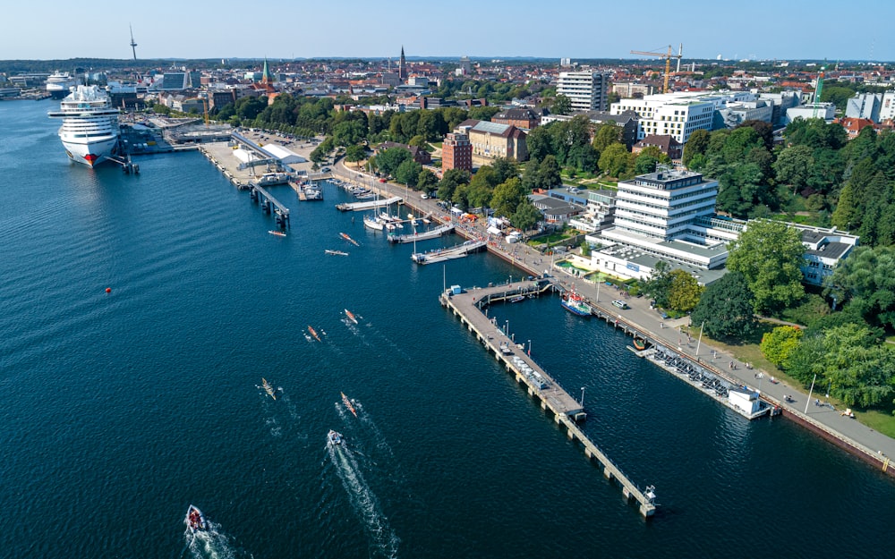 a body of water with boats and buildings along it