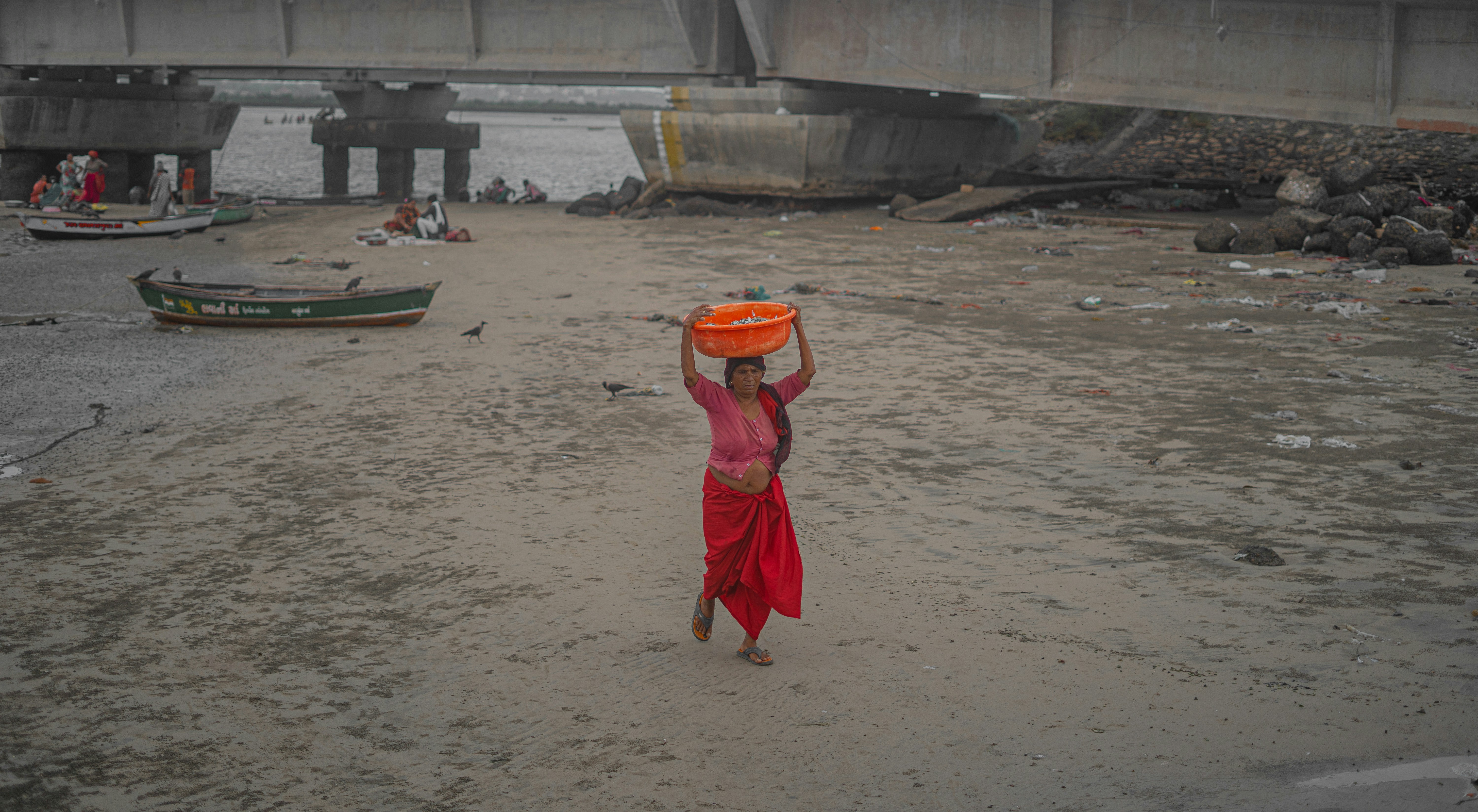 a person carrying a frisbee
