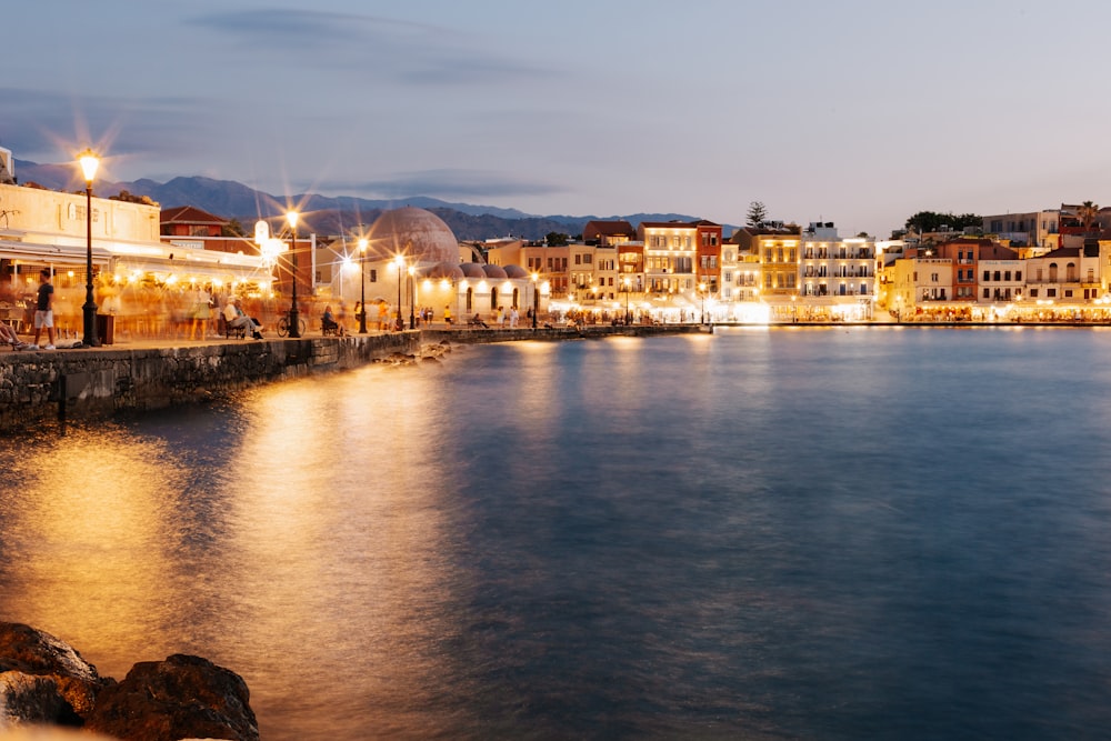 a body of water with buildings along it