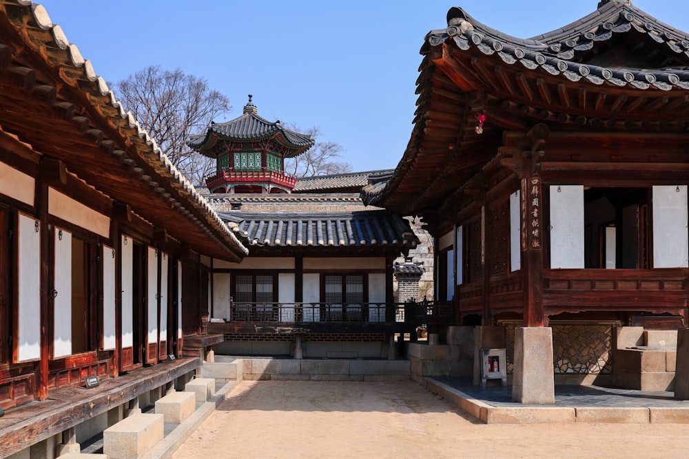 a group of buildings with a walkway