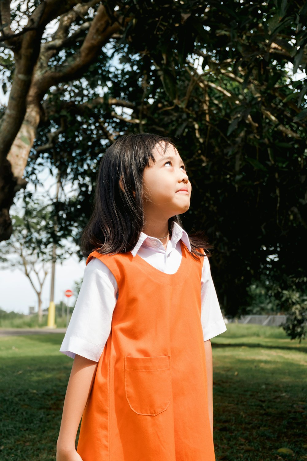 a person in an orange shirt