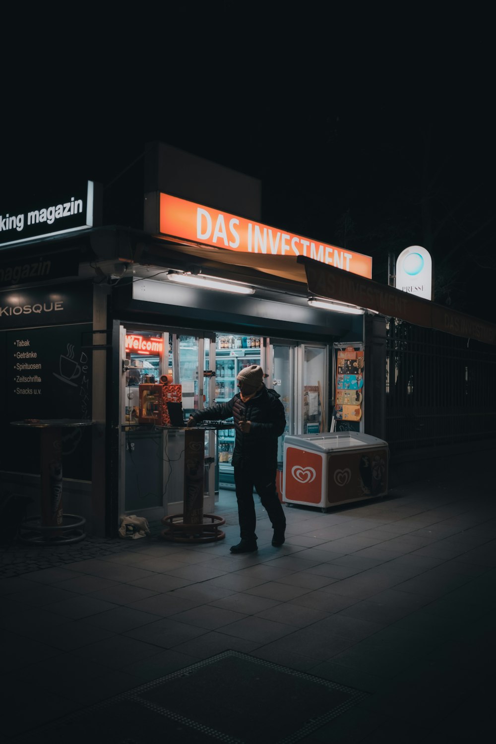 a person standing outside a store