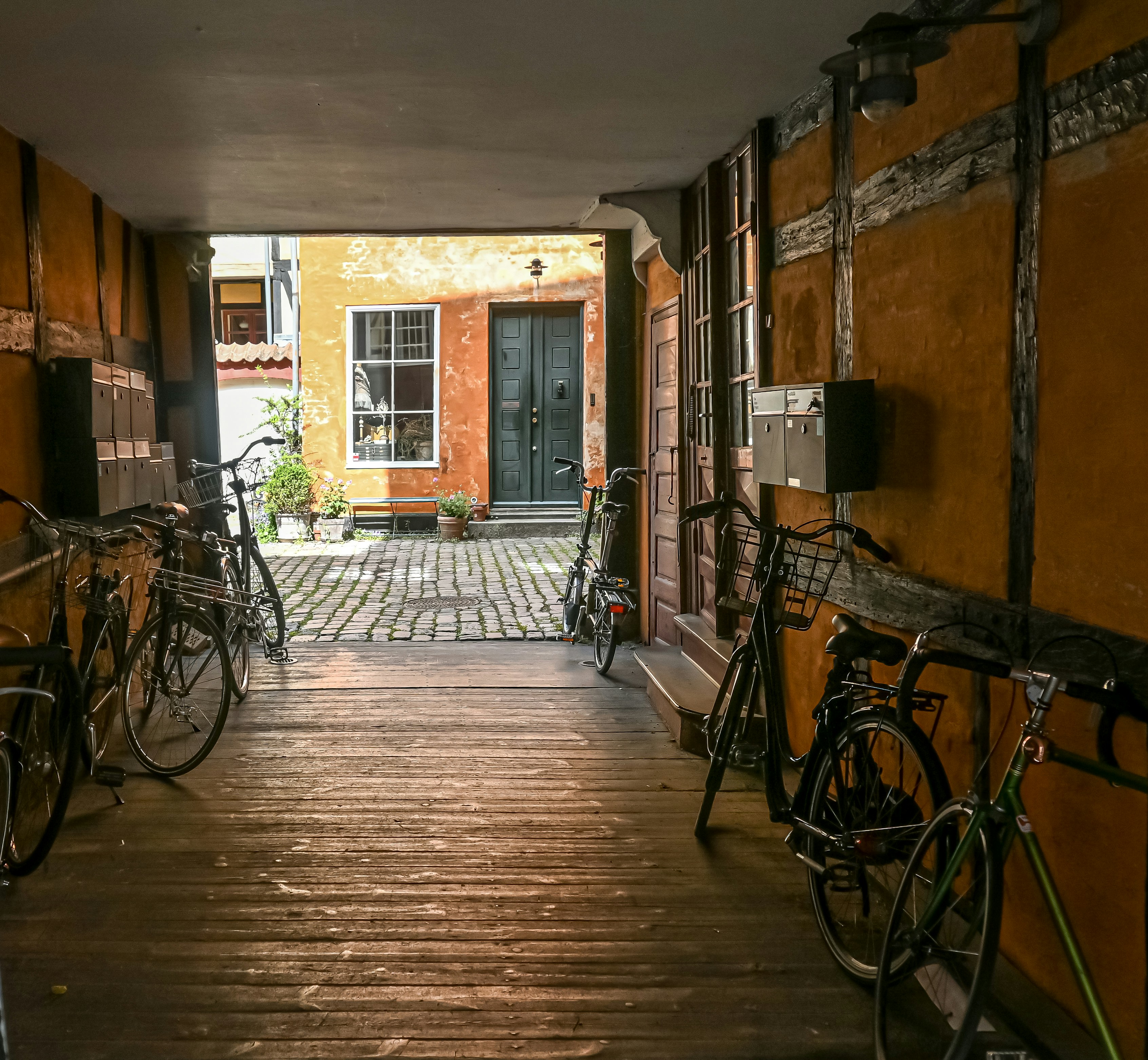 a group of bikes parked in a hallway