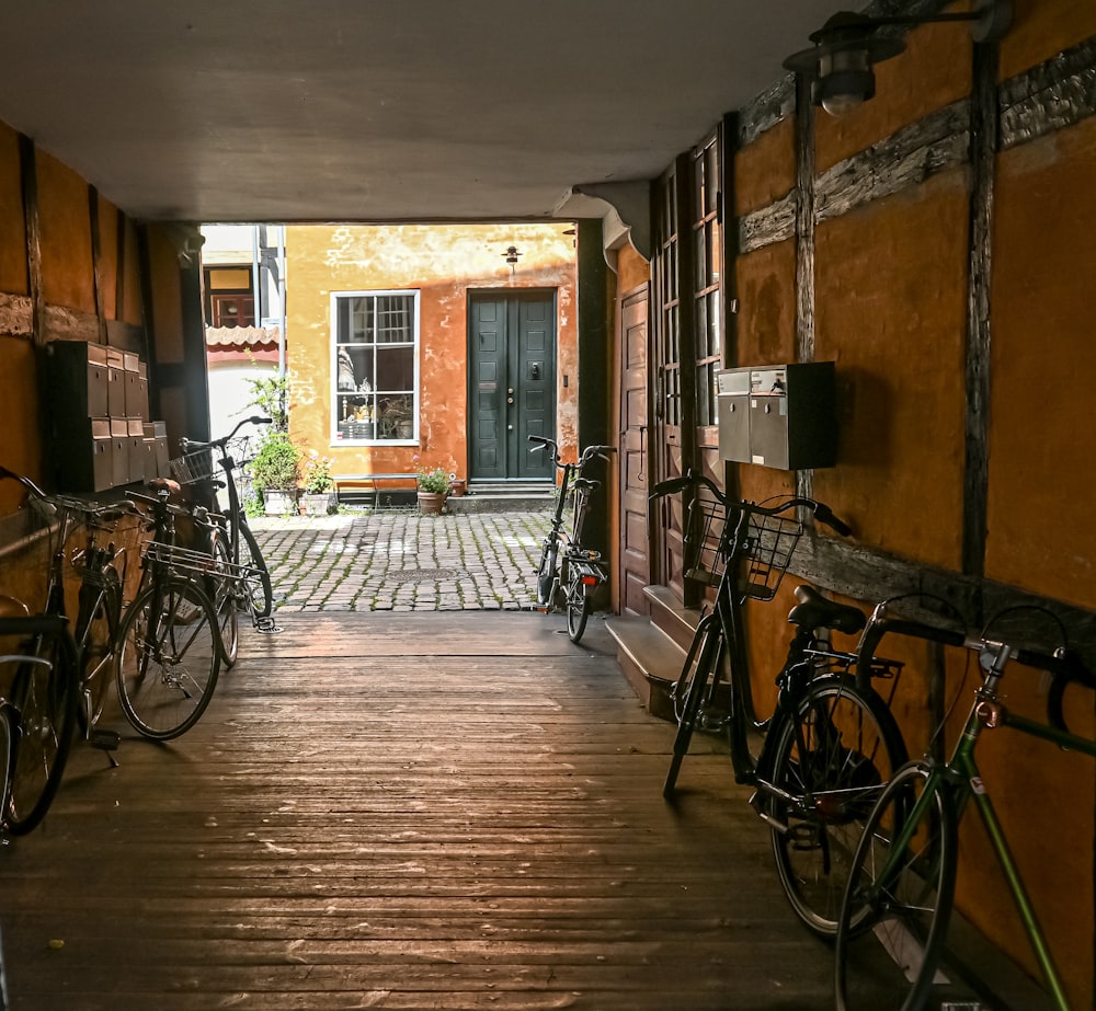 a group of bikes parked in a hallway