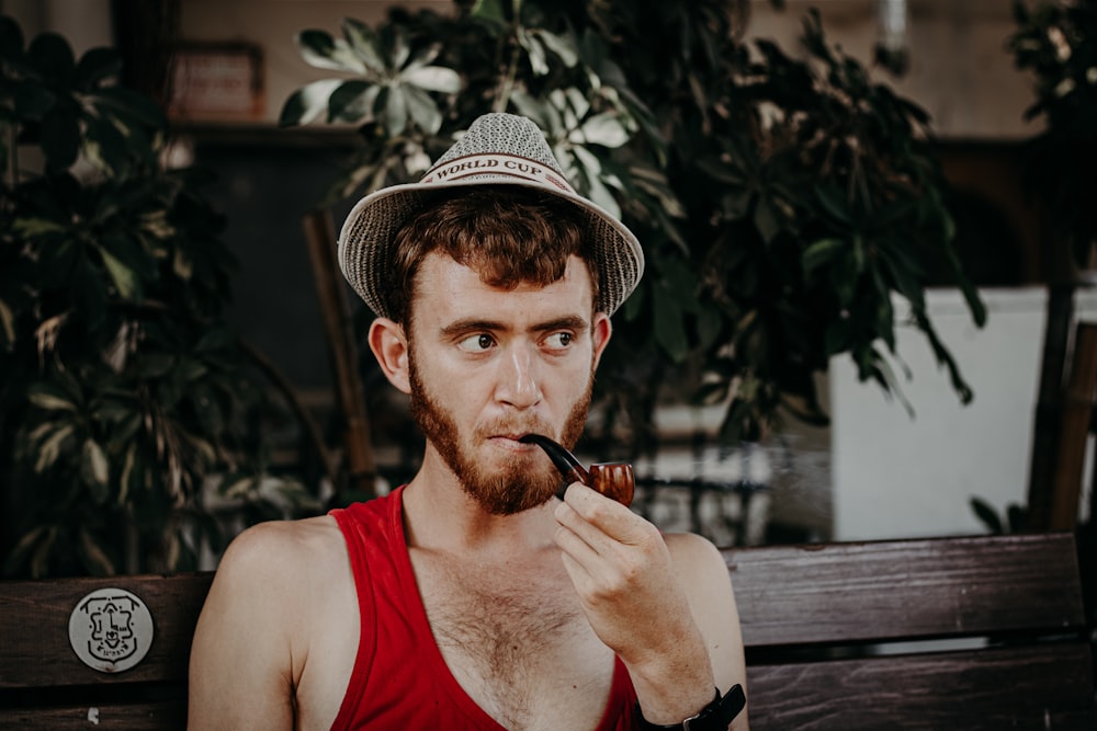 a man with a cigar in his mouth