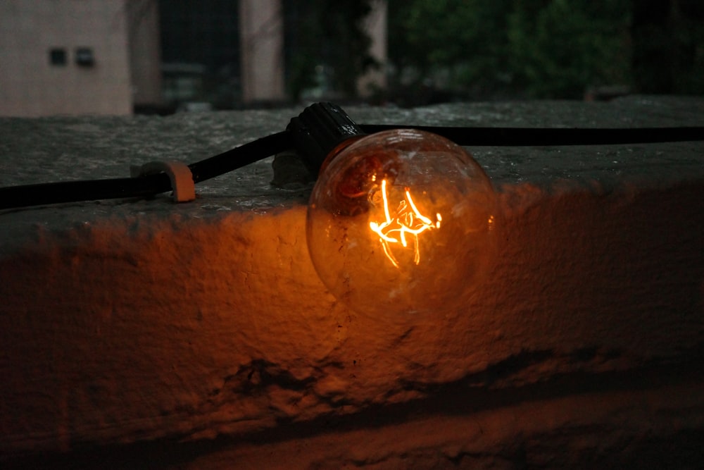 a fire pit with a flame