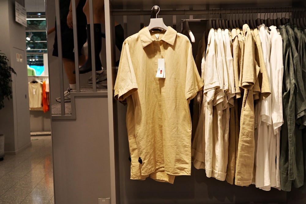 a group of clothes in a store