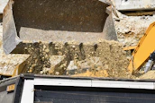 Close-up of a dump truck loaded with debris ready for transport.
