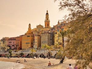 a group of people in a plaza with buildings in the background