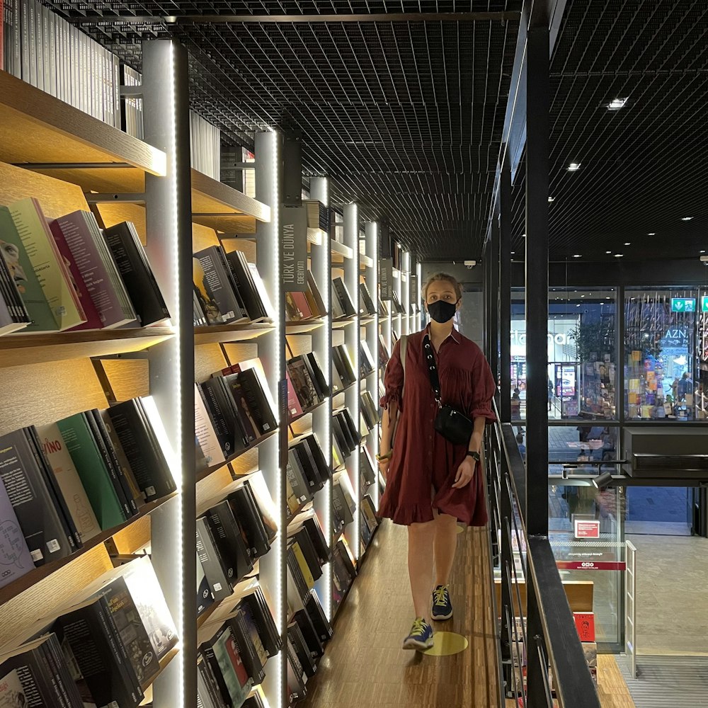 a person standing in a library