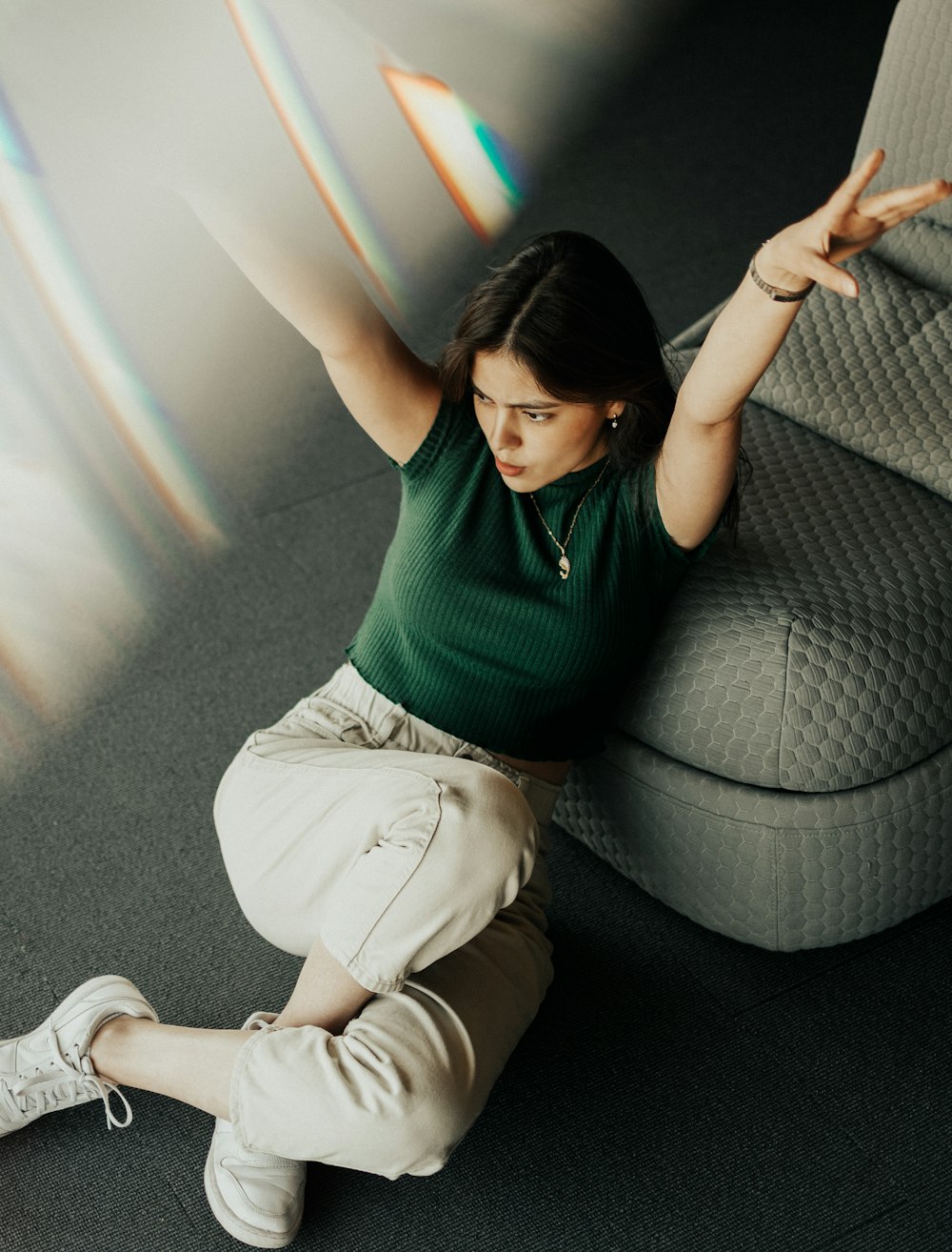 a woman sitting on a couch