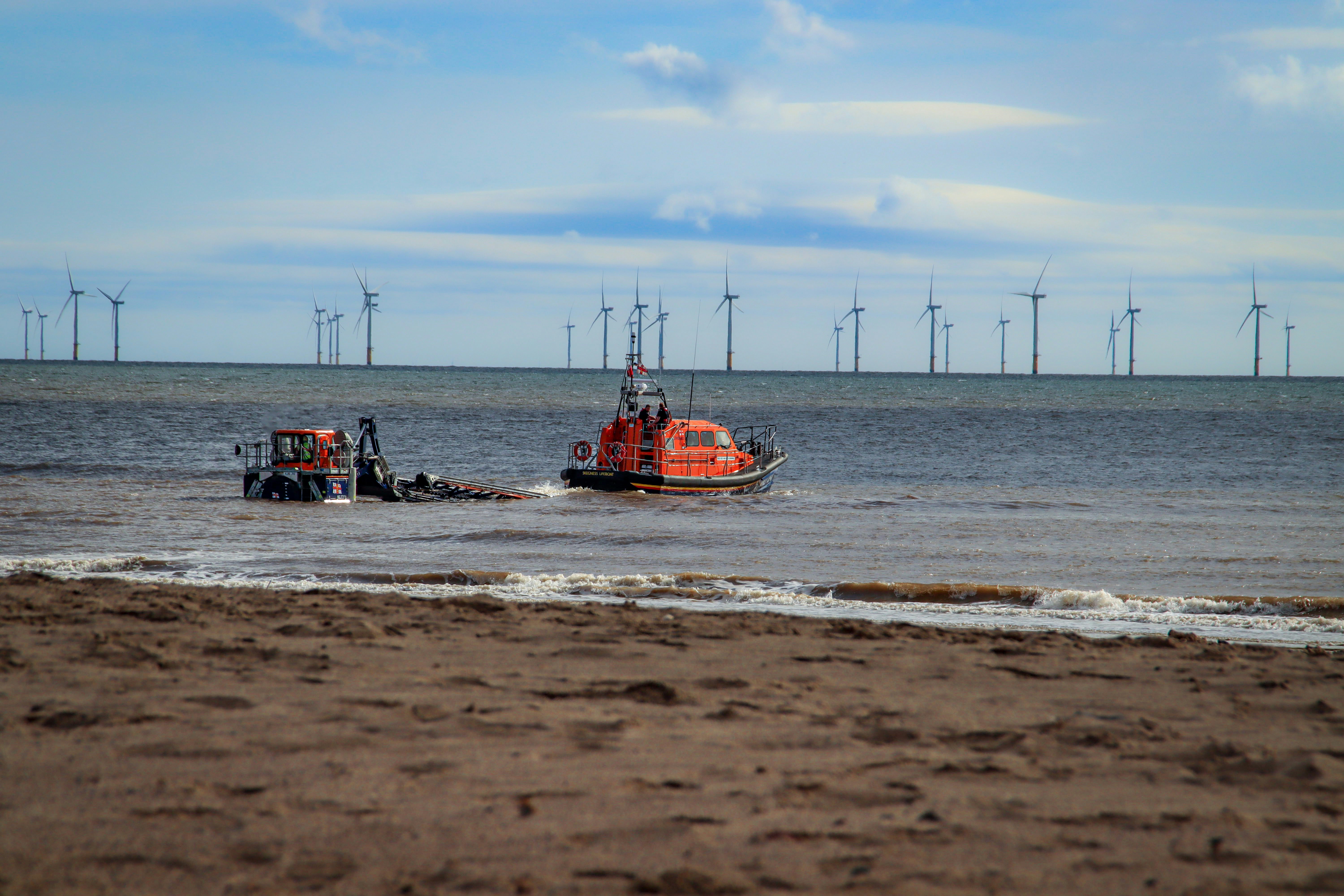 a few boats on the beach