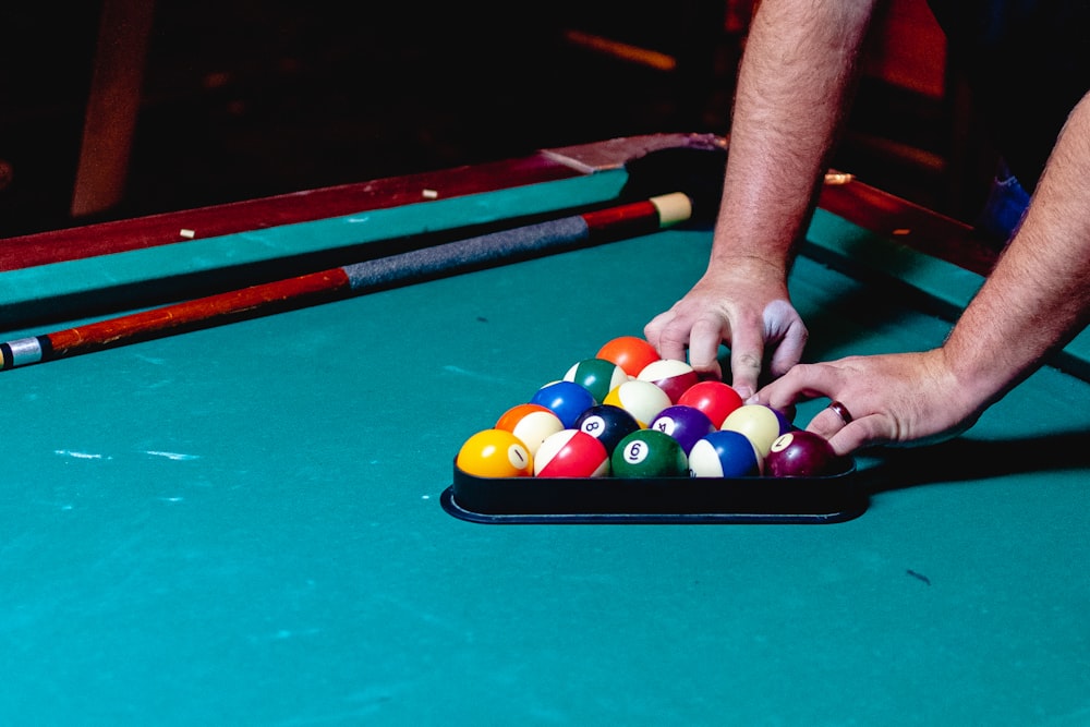 a person playing pool