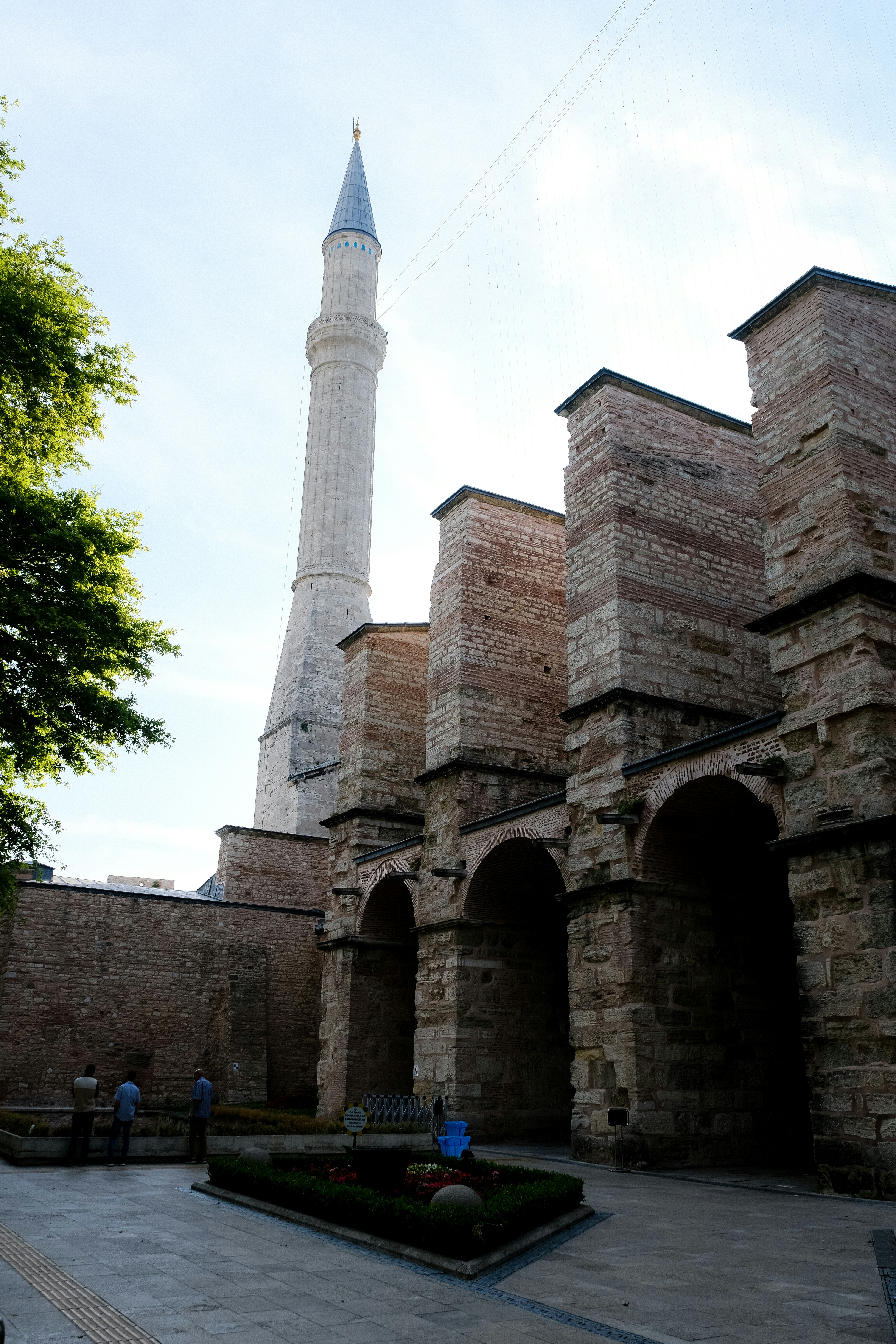 a brick building with a tall tower
