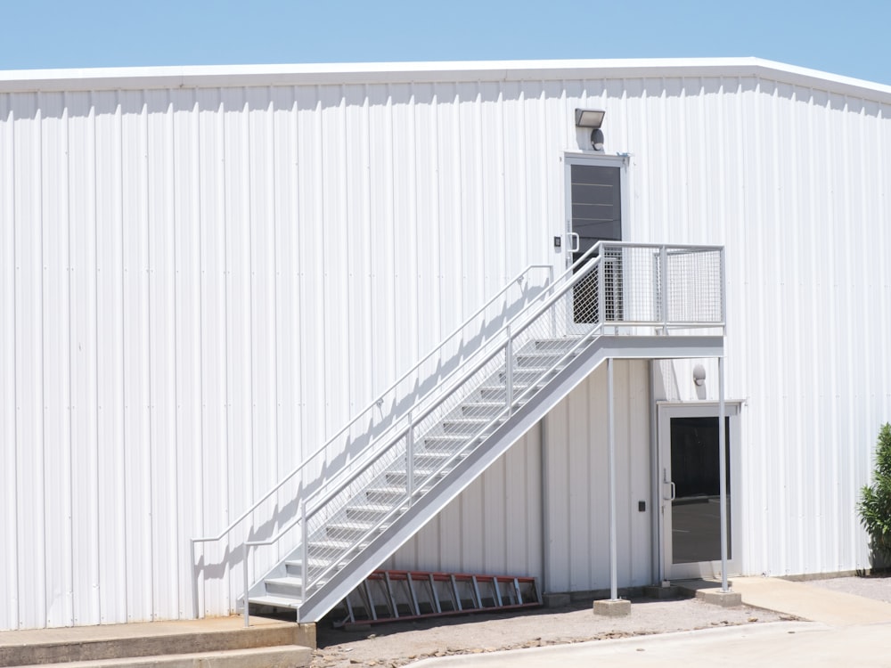 a white building with a staircase