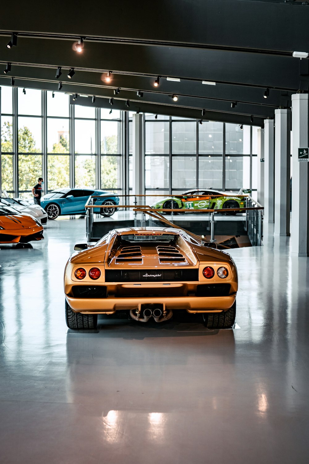 a group of cars parked inside a building