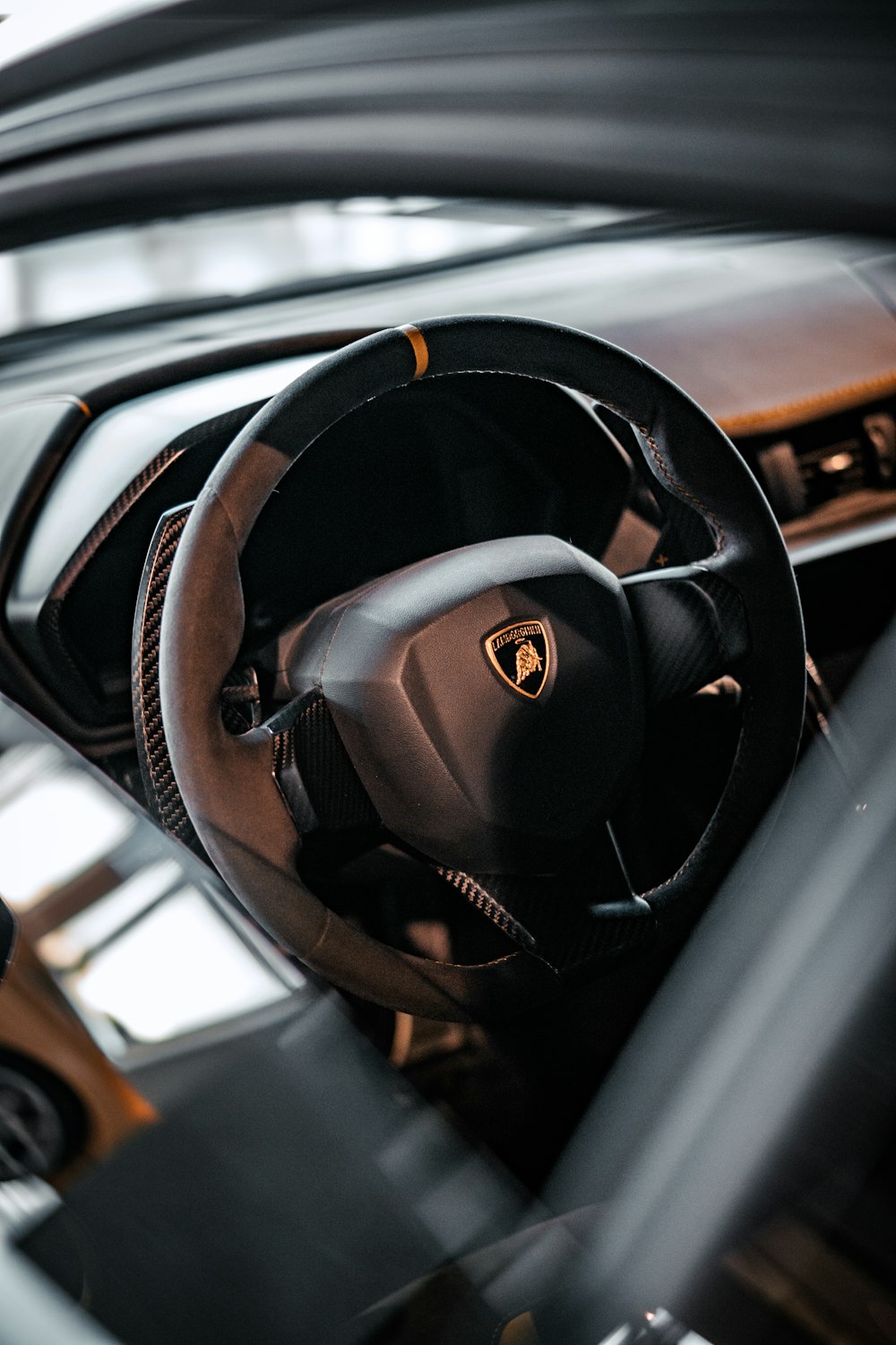 a steering wheel and dashboard of a car