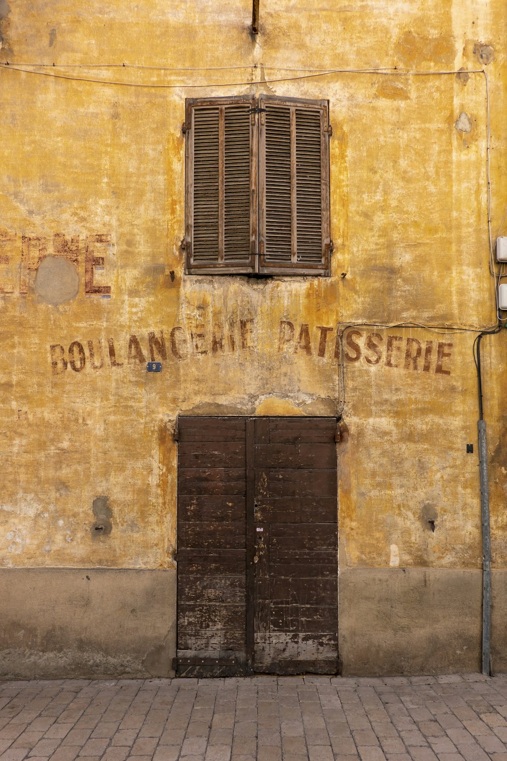 a building with a door and a window