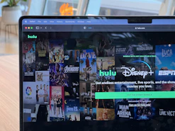 A dynamic visual of streaming video ads appearing on Hulu and Netflix interfaces.