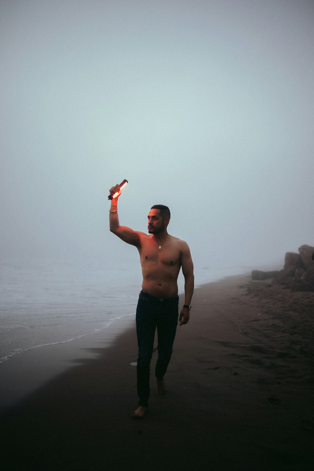 a man standing on a beach