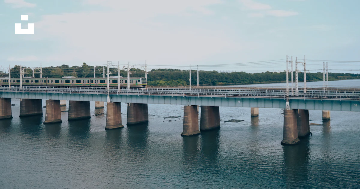 Pleng Train Bridge Java A train on a bridge photo – Free Japan Image on Unsplash