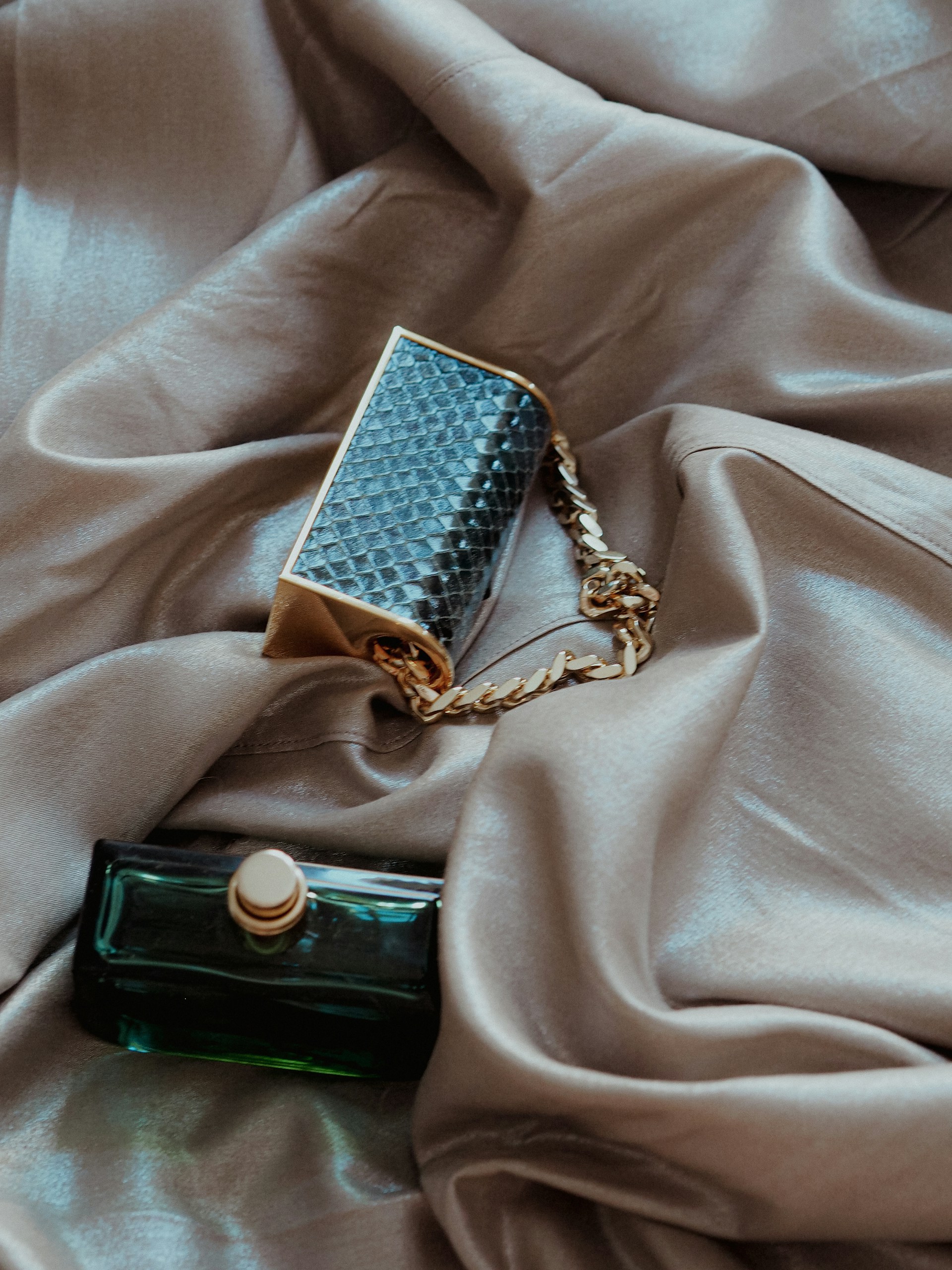 a watch on a bed
