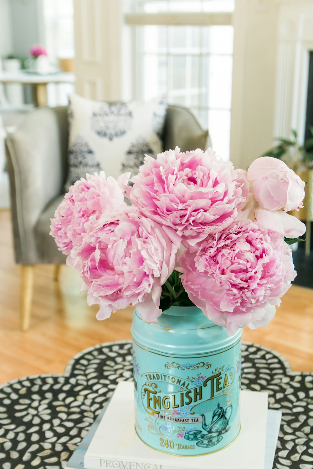 a vase with pink flowers