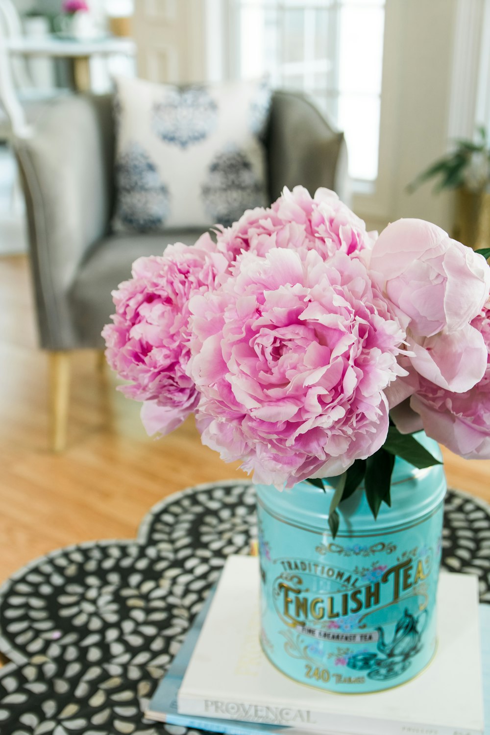 a vase with pink flowers