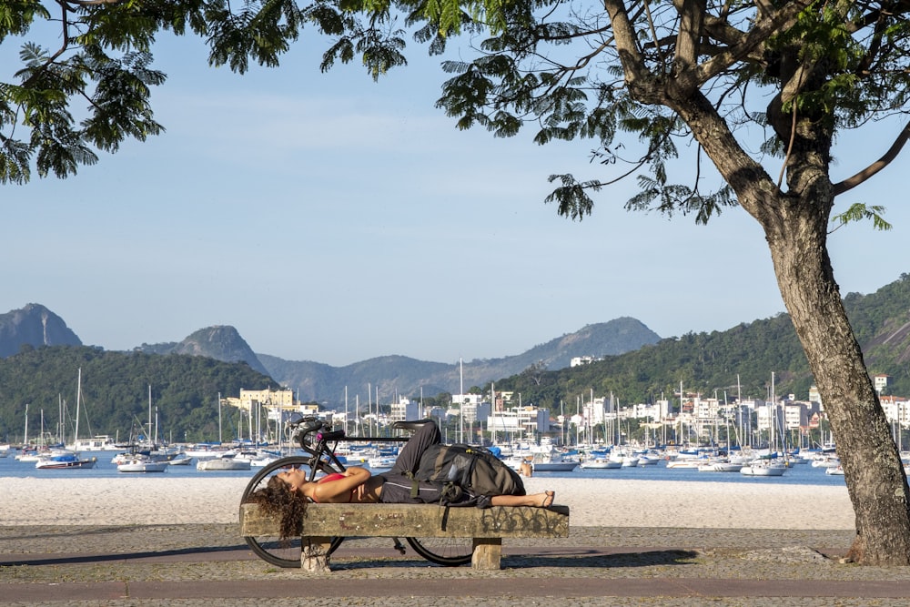 a bicycle is parked on a bench