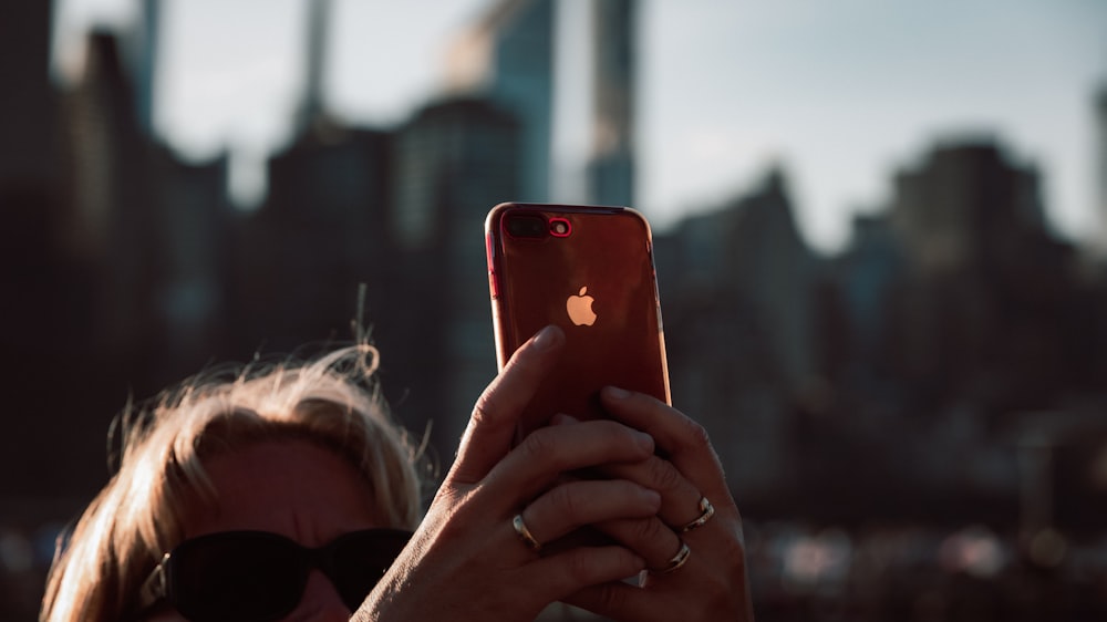 a person holding a cell phone