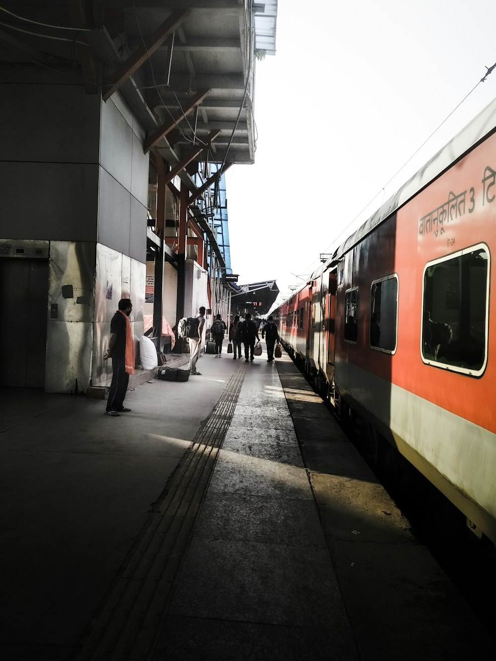 people waiting for a train