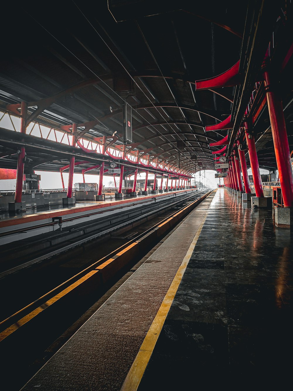a train station with red lights