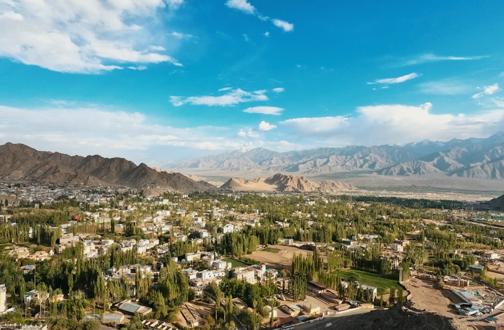 a city with mountains in the background