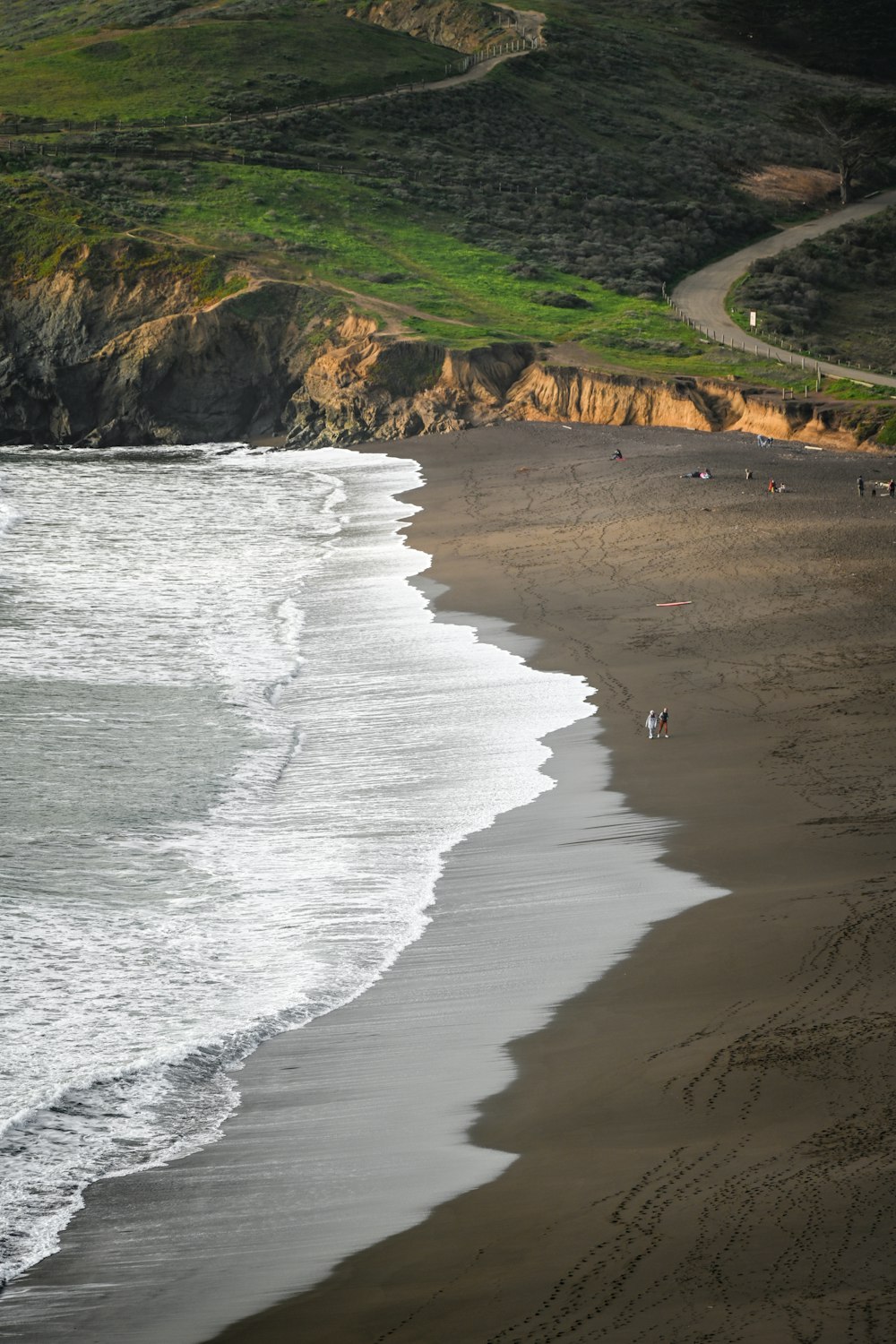 a beach with a body of water