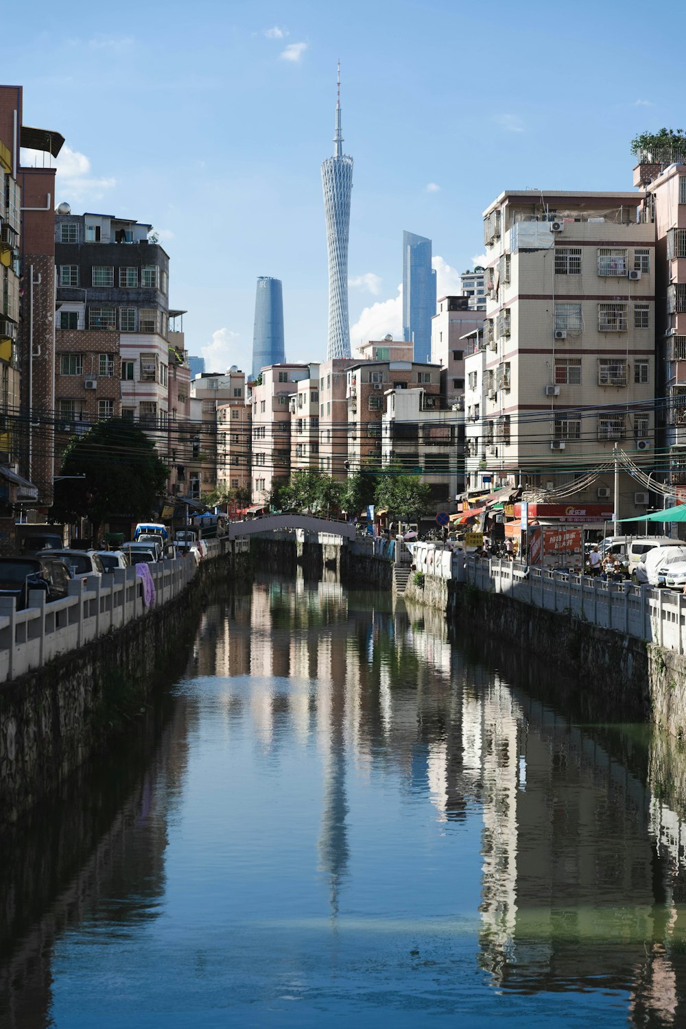 a body of water with buildings around it