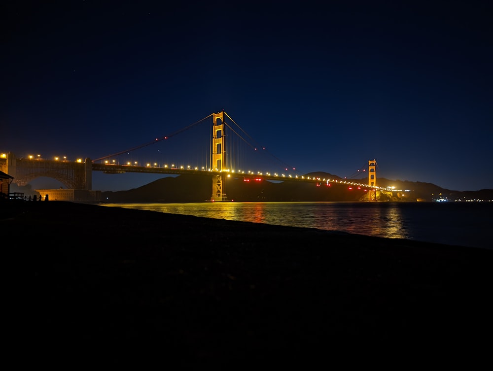 a bridge with lights at night