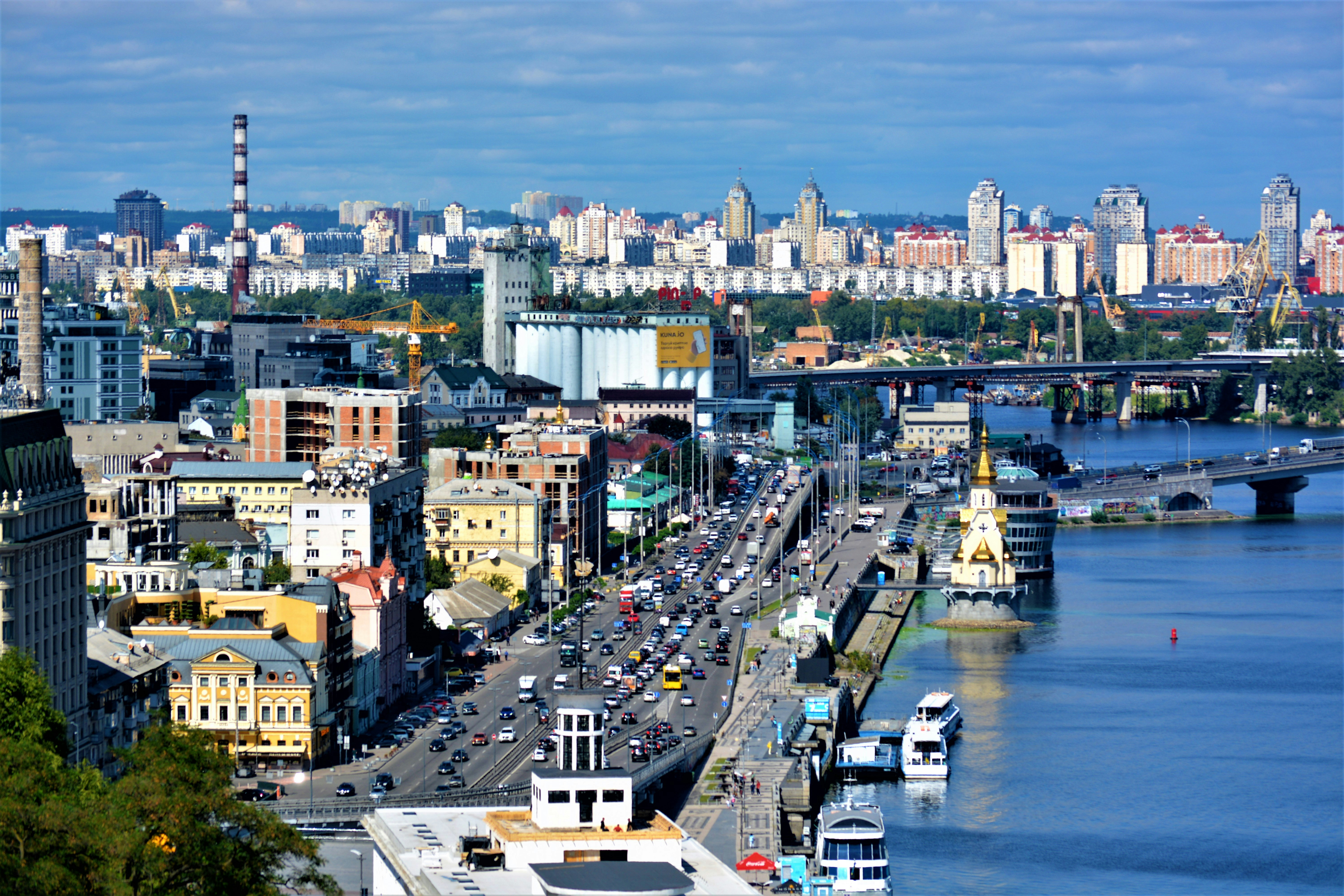 a city with a river and boats