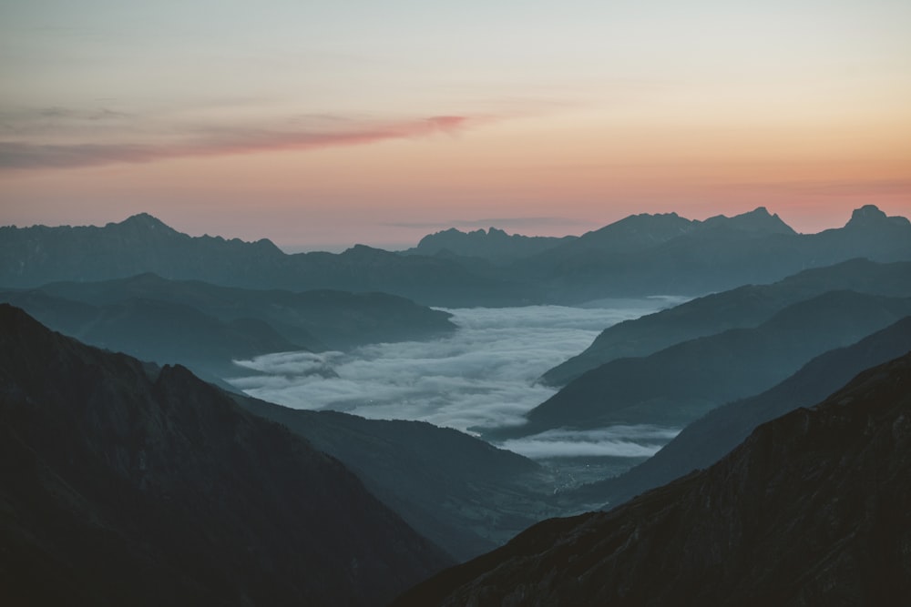 a body of water surrounded by mountains