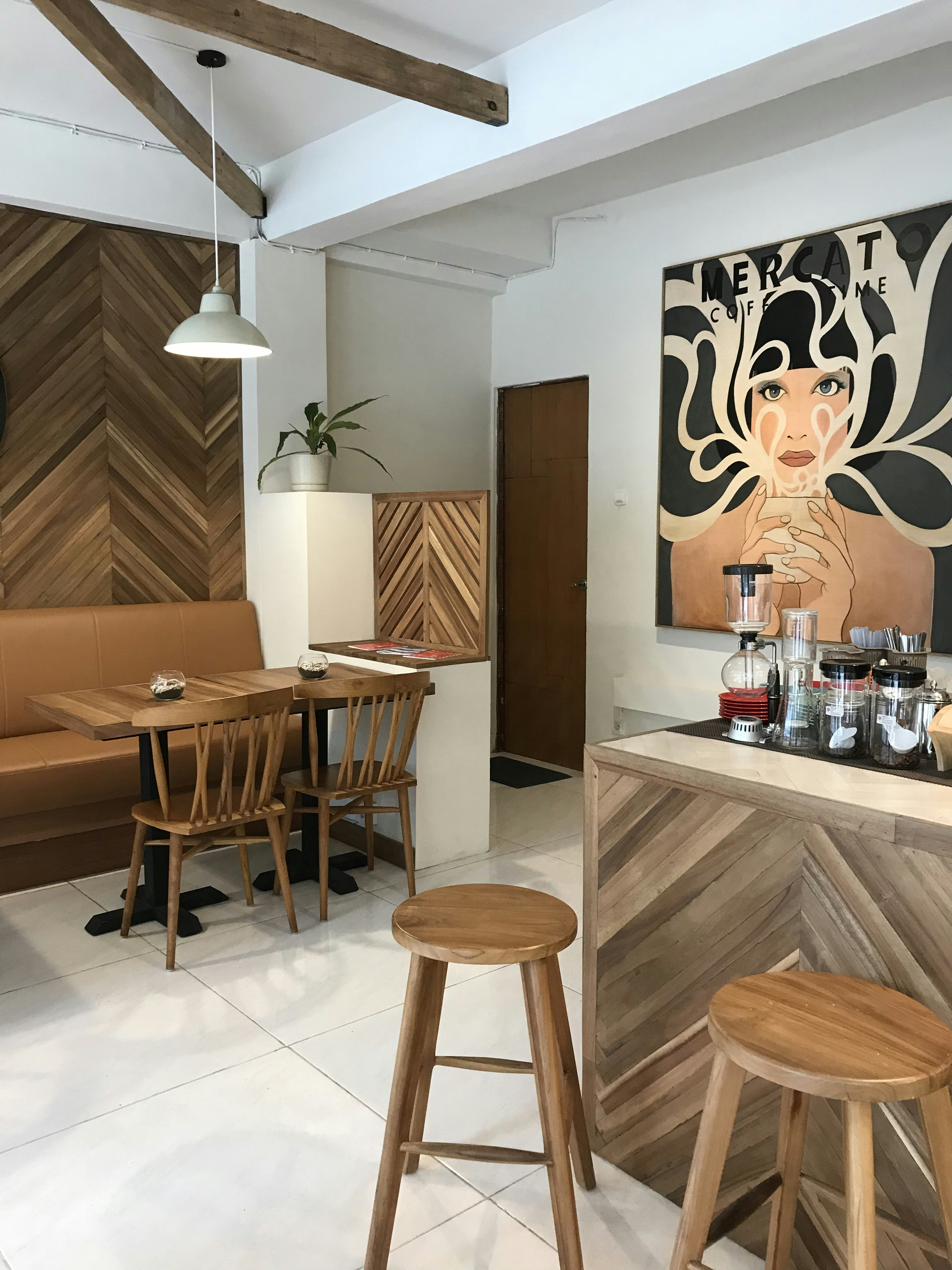 a room with a table and chairs